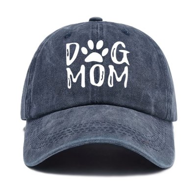 Zoom bild av keps hundkeps hundmamma solkeps solskärm sommarkeps hundförälder färgglad huvudbonad dog mom tryck