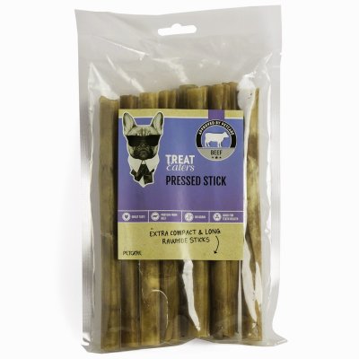 Zoom bild av hundtugg tuggpinnar tuggrullar nöt biff hund tugg hundgodis hundsnacks nöthud nötkött